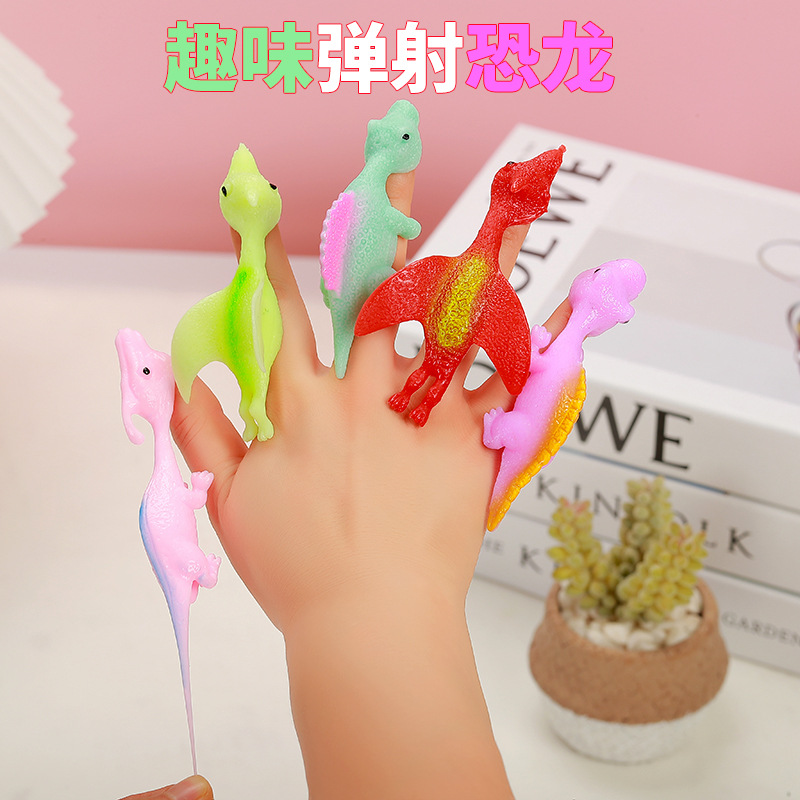 Catapult dinosaur fun toy finger Dart launch small dinosaur decompression soft glue cross-border new exotic supply wholesale