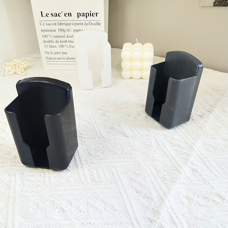 Universal TV fan air conditioner remote control storage box clothes hanger storage wall-mounted desktop mobile phone charging rack