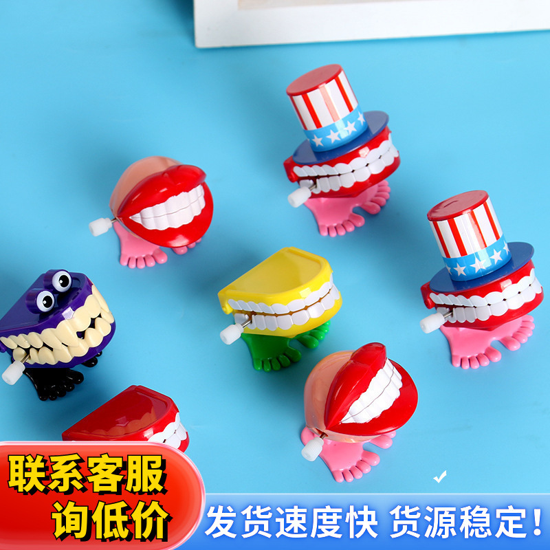 Стоматологическая клиника открытие маленькие подарки детские игрушки пружинные прыгающие зубы