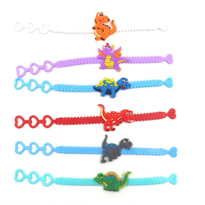 Cross-Border Factory Direct European and American three-hole adjustable dinosaur bracelet pvc cartoon wrist strap dinosaur children's bracelet