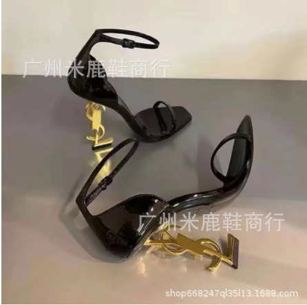 2023YS Woods same style black patent leather sexy one-strap metal letter heel high heel sandals female socialite style