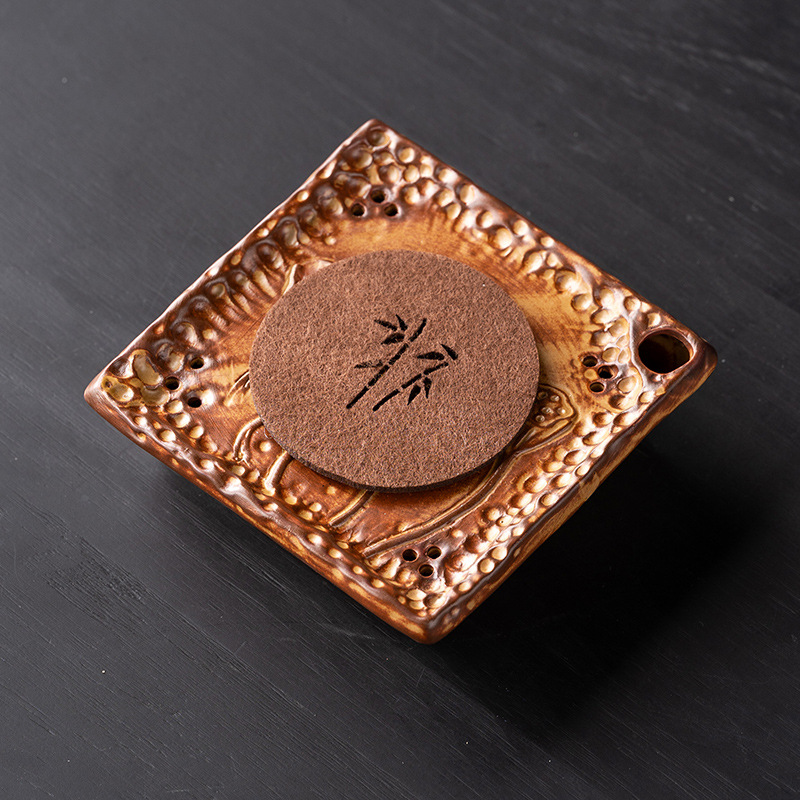 Large Japanese-Style Purple Clay Teapot with a Square Base for Brewing Tea, Featuring a Rustic Pottery Design