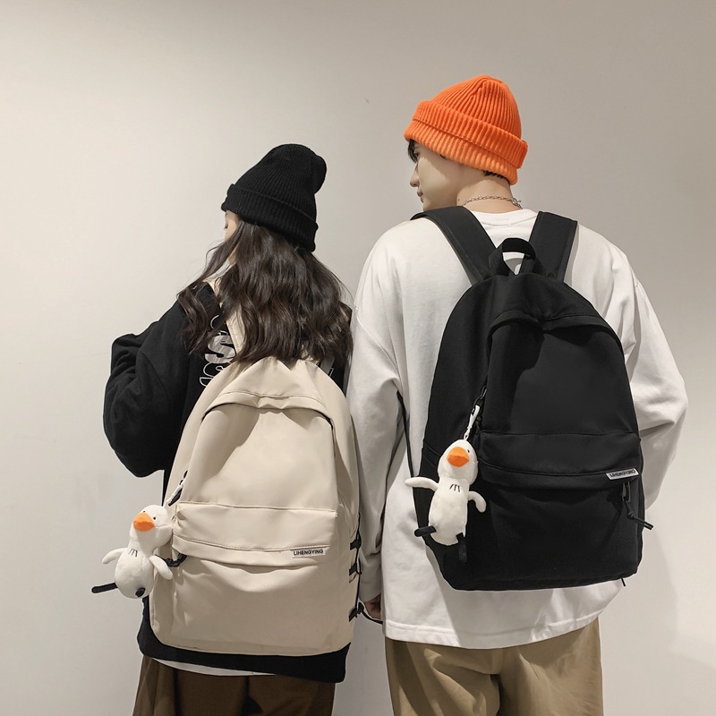 Trendy backpack men's simple high school student large capacity travel backpack women's Japanese all-match College student schoolbag