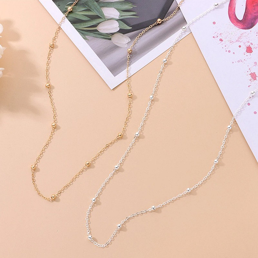European and American cross-border sexy women's body chain summer beach casual metal jewelry simple clip ball bead waist chain