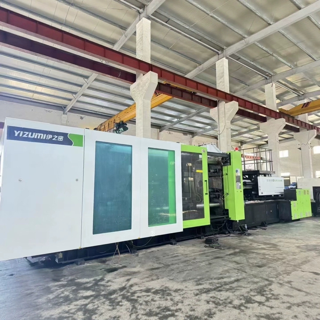 Трансфер Yizumi Un1400A5S, нижняя форма 1310, винт 125, объем впрыска 7300 грамм, использовался 4800 часов