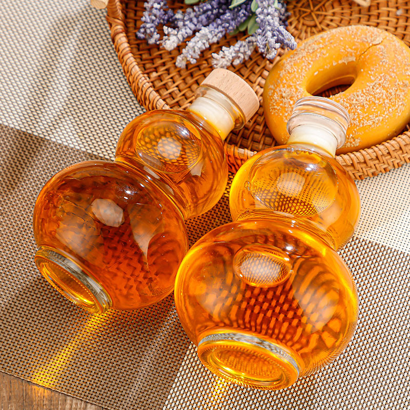 New creative ginseng fruit wine bottle milk tea cold extract bottle sealed sparkling wine glass bottle net red gourd wine bottle