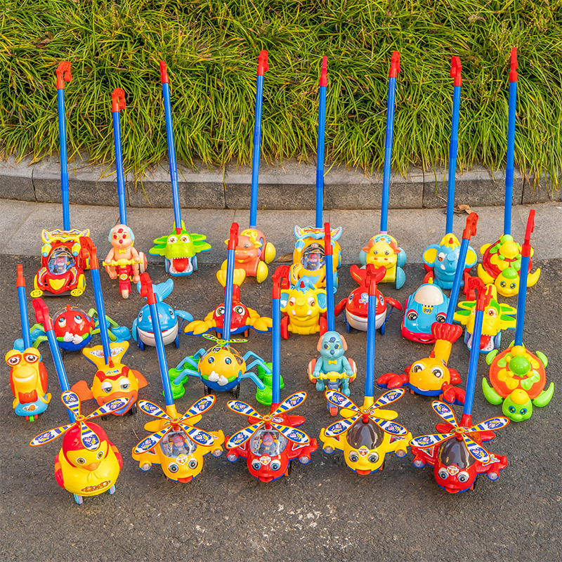 Stall supply hot sale with bell adorable duck push push music children's trolley toys baby push toys