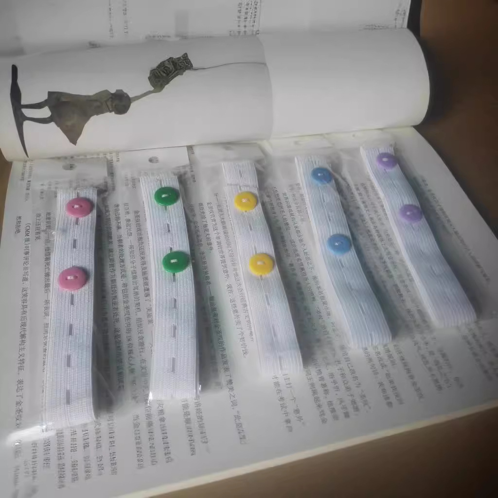 Factory wholesale baby diaper buckle baby diaper fixing belt binding diaper adjustable elastic band buttonhole belt