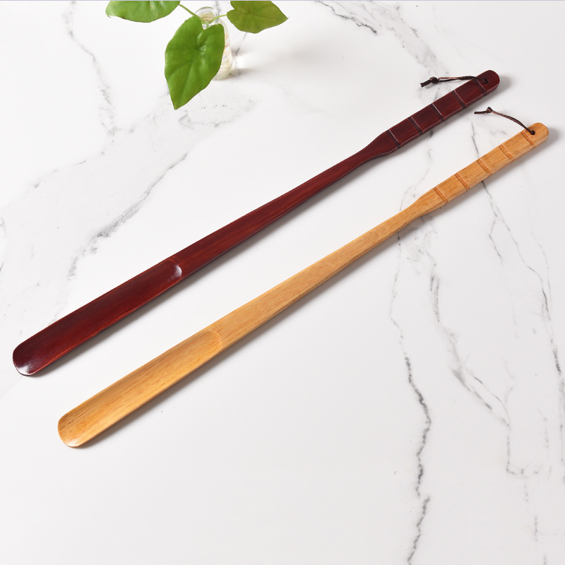 Factory wooden shoe puller solid wood shoe lifter lazy wearing shoes long handle pregnant women elderly lengthened shoe pump wholesale