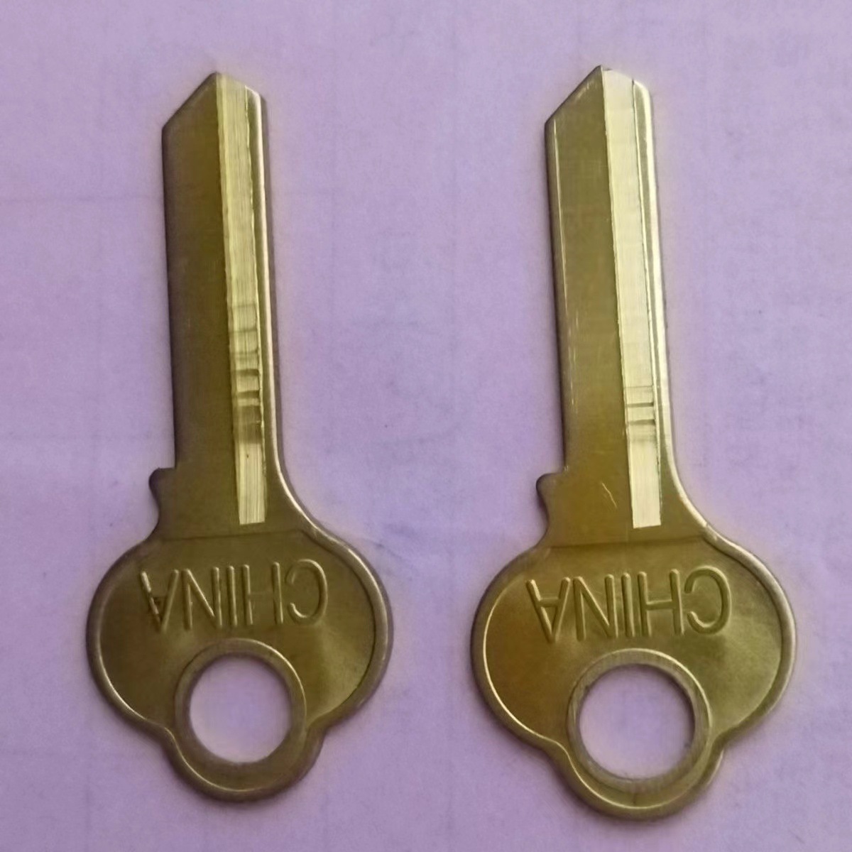 Pure copper round handle single slot key embryo Beijing 1 inch 2 Changan forward and reverse padlock open tooth key embryo wholesale