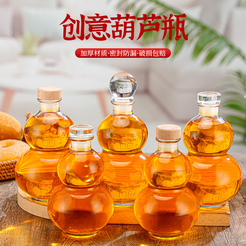 New creative ginseng fruit wine bottle milk tea cold extract bottle sealed sparkling wine glass bottle net red gourd wine bottle