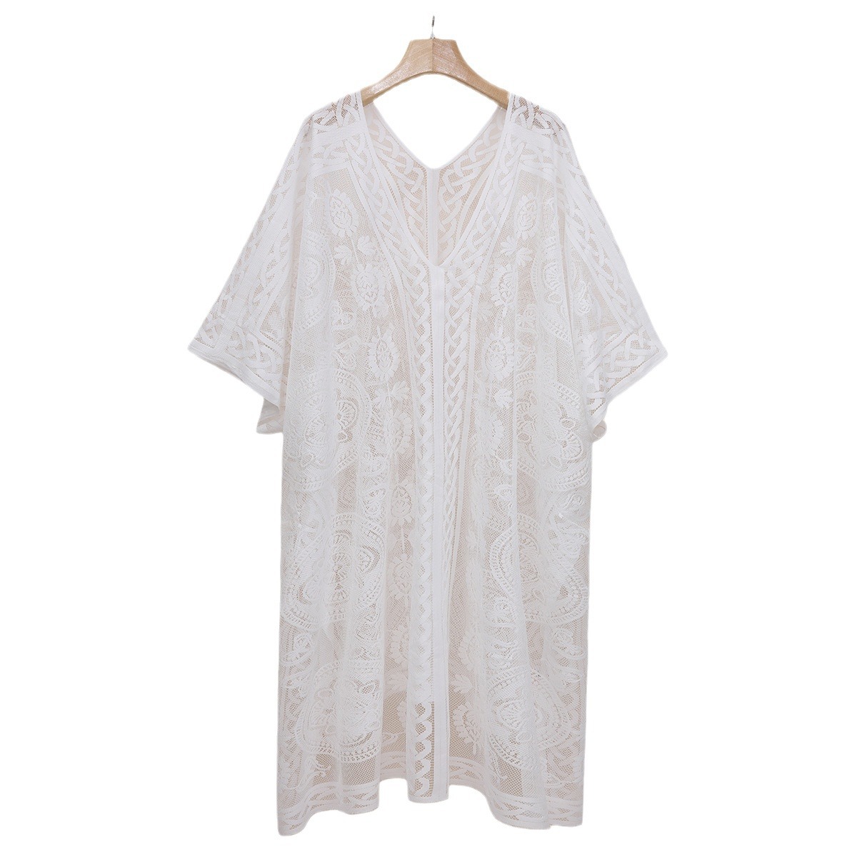 New European and American beach holiday sexy blouse ventilation fashion sunscreen V-neck pattern thin beach skirt wholesale