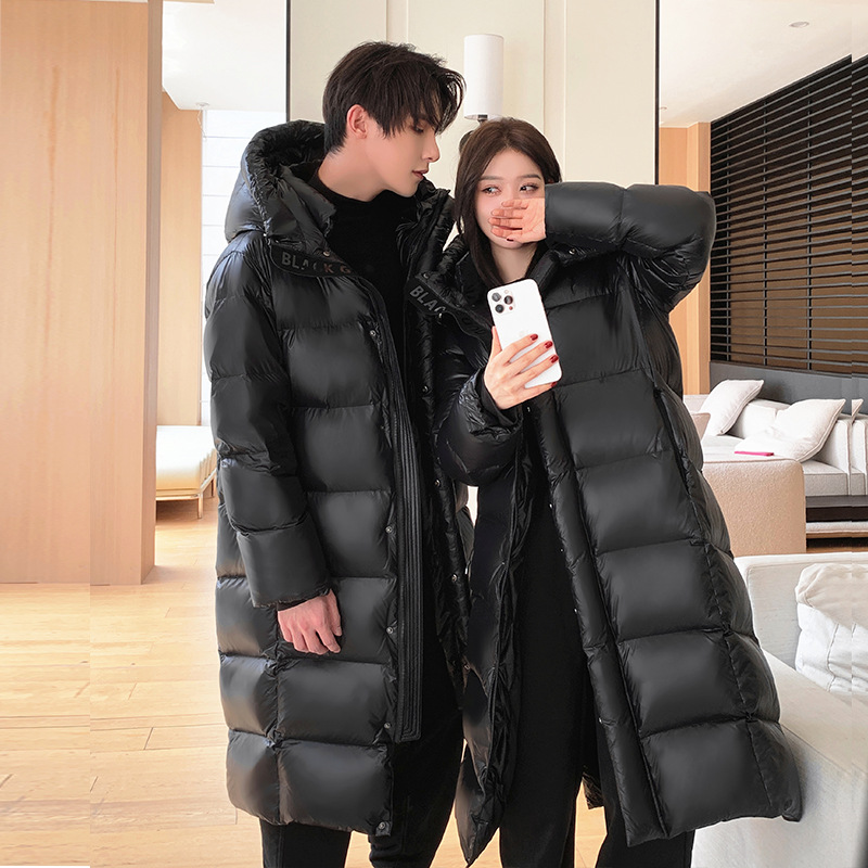 Утолщенный 2024 северо-восточный путешествия черный золотой новый длинный выше колена пуховик для пары мужчин и женщин