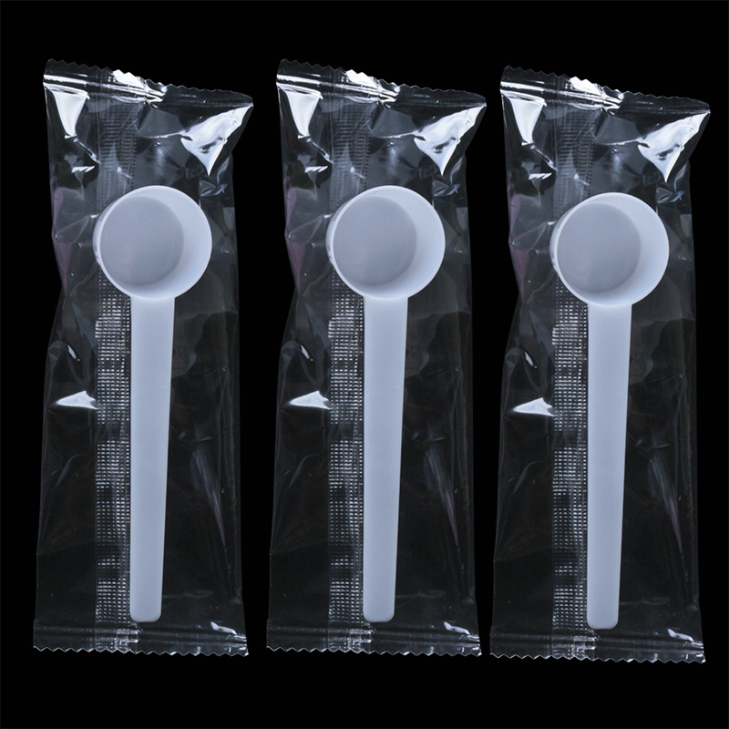 Separate packaging 5G measuring spoon 5g plastic spoon flat bottom powder liquid measuring spoon mask spoon with scale three colors