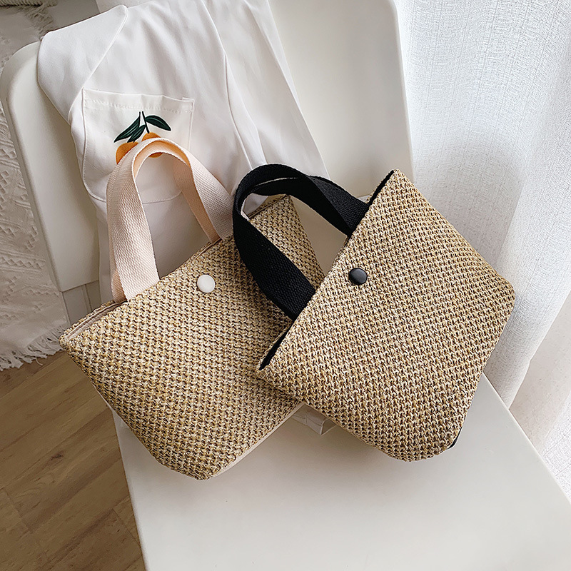 2020 New idyllic fashion shoulder Women's bag woven portable contrast color Beach straw retro bag foreign trade Wholesale