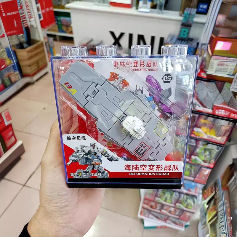 Cantonese Star Sea, Land and Air Transformation Team Boy Robot Combination Model Helicopter Armor Tank Seven-In-One Toy