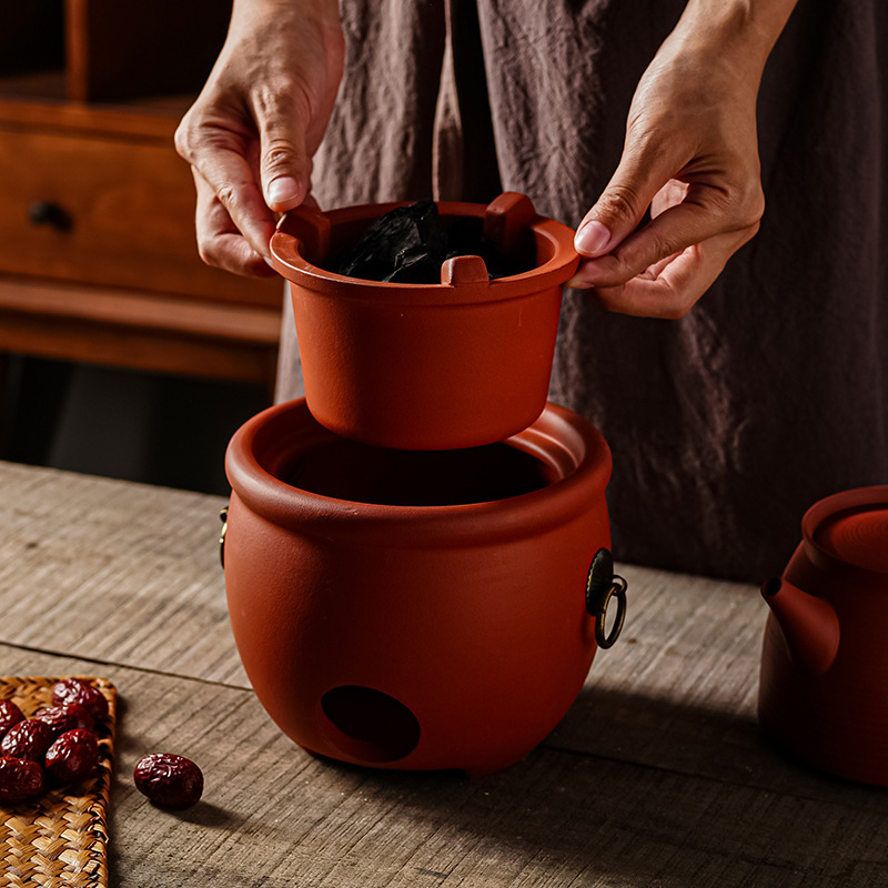 Handmade small charcoal stove red mud Kung Fu Tea stove olive carbon stove ceramic side handle pot Chaoshan Chinese retro stove tea boiling