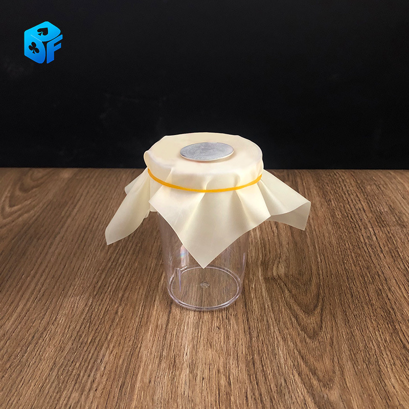 Black hole legend coin wear film coin wear cup coin into cup thin transparent through magic props
