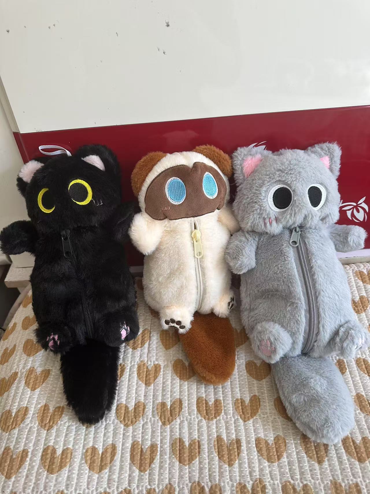 Factory wholesale cute cartoon plush children's coin purse animal doll soft cute doll pencil case middle school student stationery