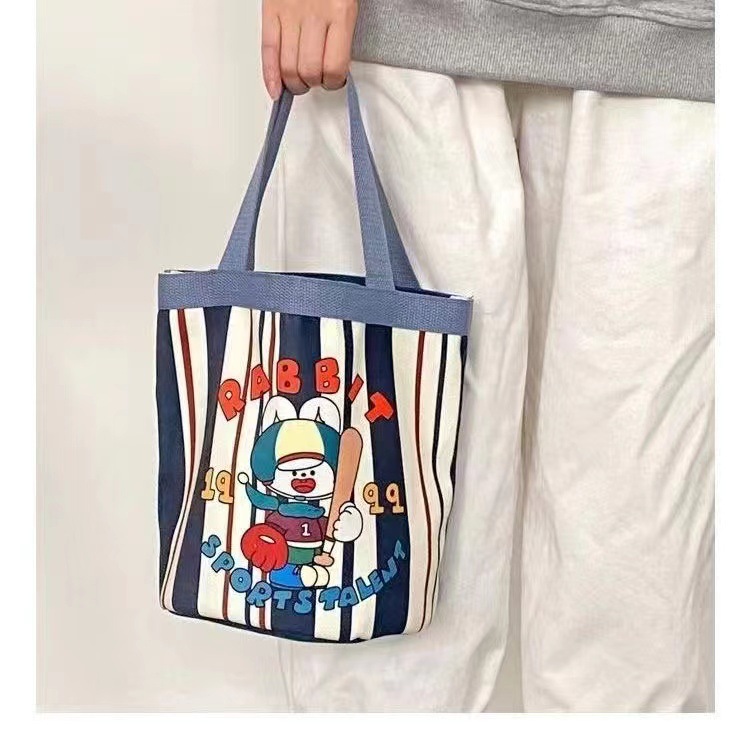 Cute Graffiti Bucket Bag Ins Printed Cylinder Bag Canvas Lunch Bag Han Feng Girl Hand Lunch Box Mummy Bag
