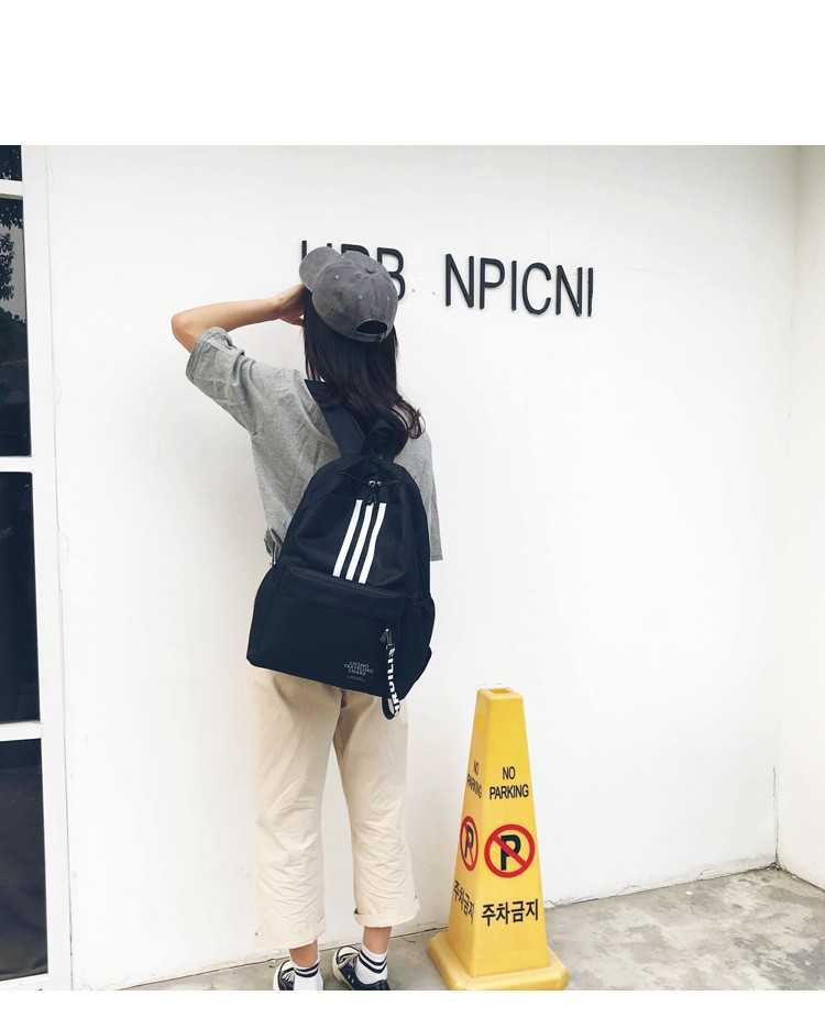 Schoolbag men's fashion fashion high school junior high school student large capacity primary school student campus backpack Korean casual backpack