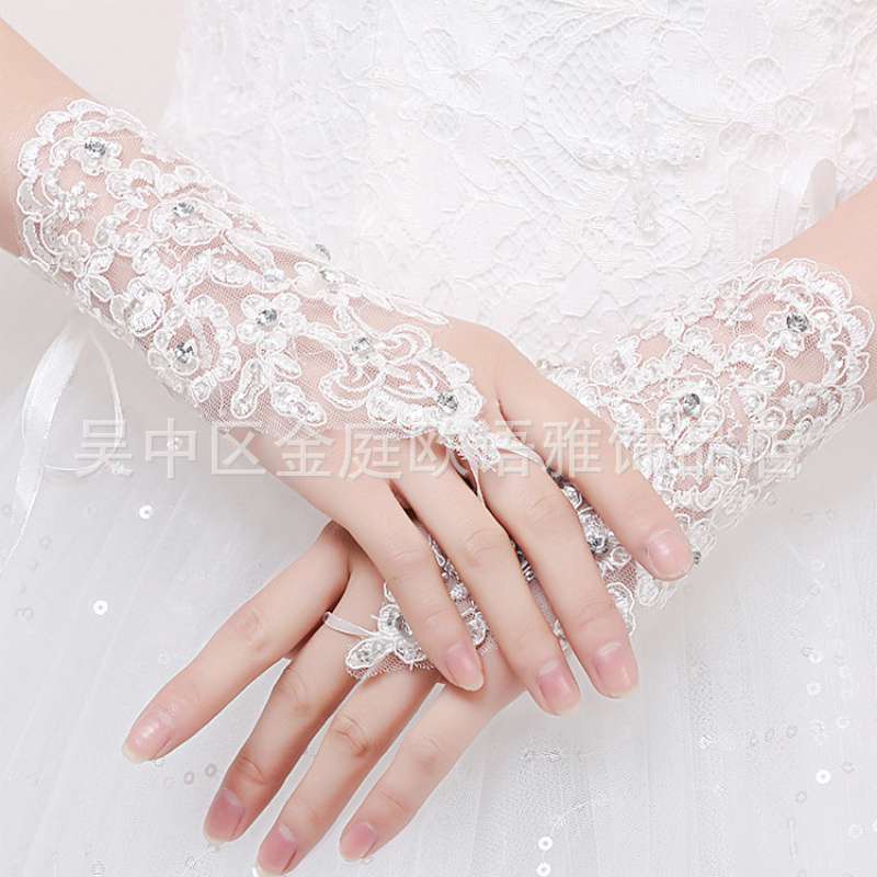 Foreign trade wholesale factory direct bride lace gloves short sunscreen lace gloves sleeve small sequins photo