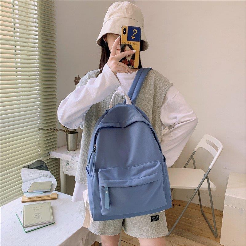 ins Korean style solid color simple fashion backpack men's 2022 new men's and women's casual middle school student backpack fashion