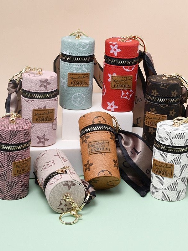 European and American presbyter coin purse 2023 new compact bag pendant earphone bag mouth red envelope mini keychain bag