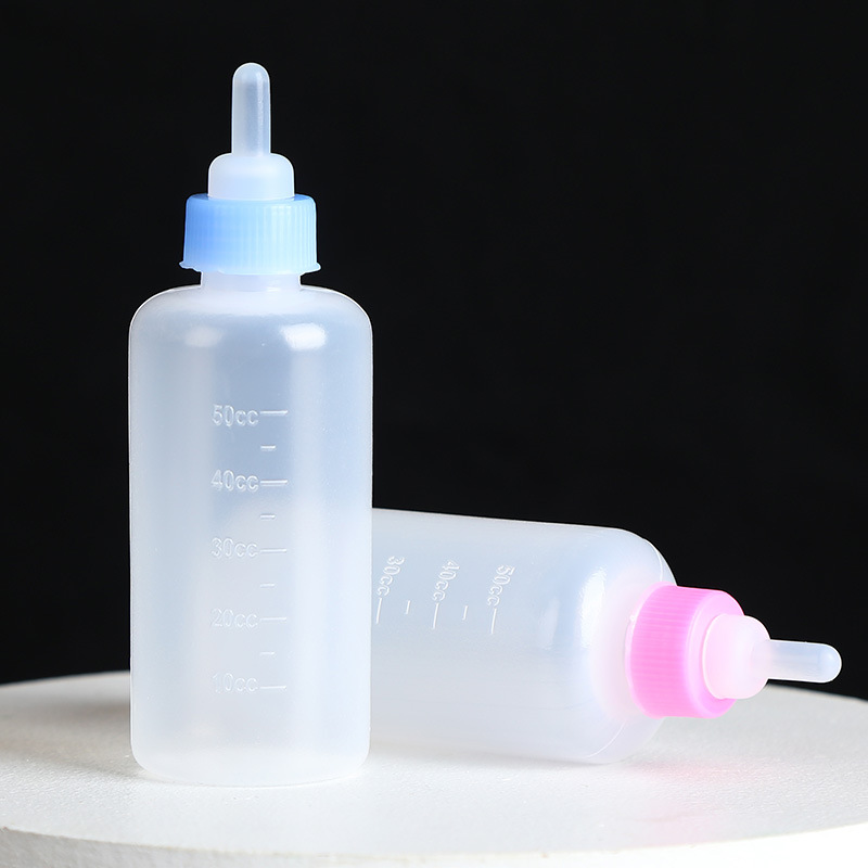Pet mini feeding bottle 60ML Bichon small dog feeding bottle free cleaning suit four nipple factory direct sales
