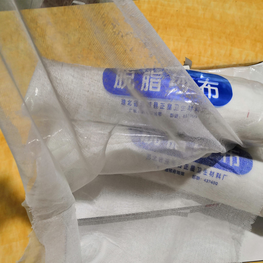 Factory wholesale absorbent gauze medical km roll fine gauze silicone mold reinforcement textile cotton gray cloth